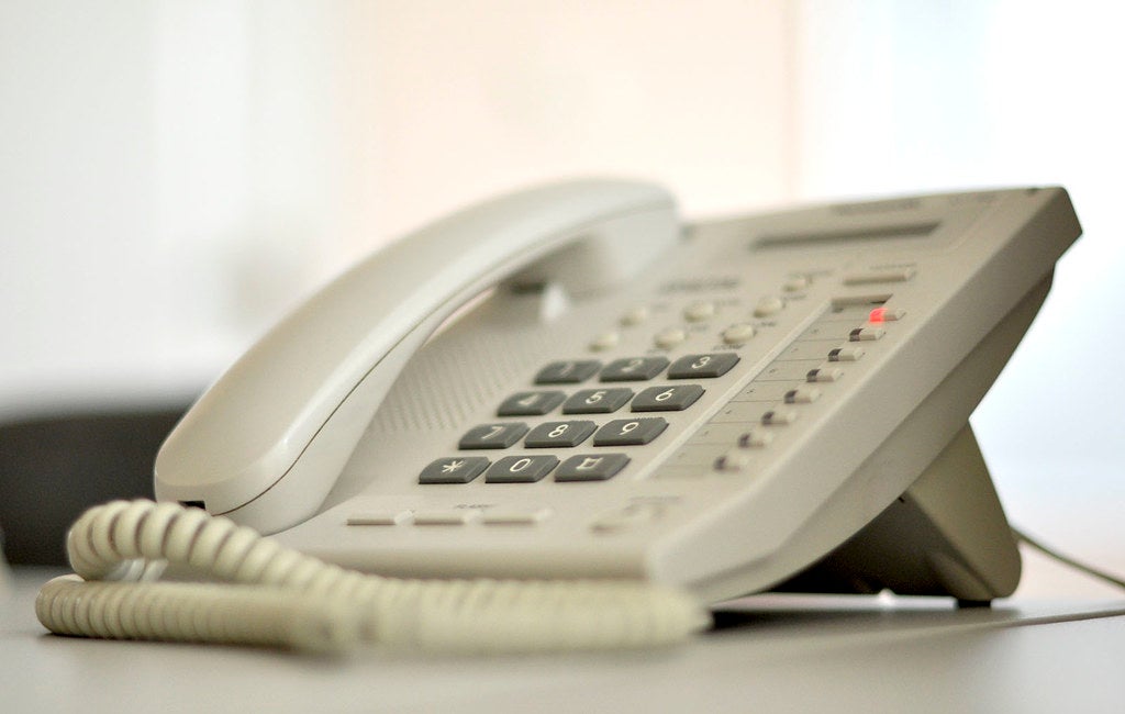 Beige colored landline phones